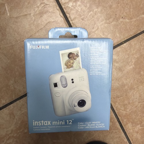Nuova fotocamera istantanea - nuova,