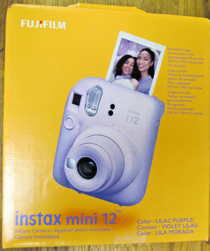 Nuova fotocamera istantanea - nuova,