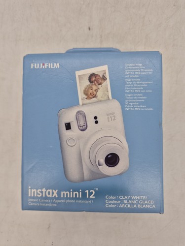 Nuova fotocamera istantanea - nuova,