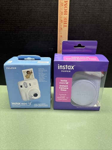 Nuova fotocamera istantanea - nuova,